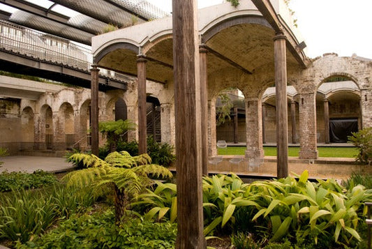 Sunken garden with brick arches and greenery at Paddington Reservoir Gardens Sydney